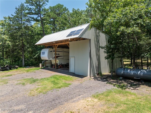 11667 Falling Rock Rd, Havana, AR 72842 - view of pole building with a carport and driveway