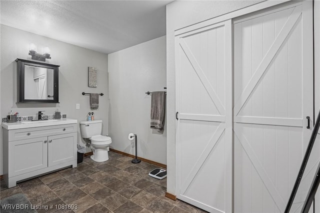 11667 Falling Rock Rd, Havana, AR 72842 - bathroom with vanity and stone finish flooring