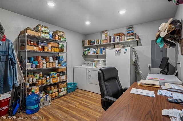 11667 Falling Rock Rd, Havana, AR 72842 - office space featuring electric panel, wood finished floors, washer and dryer, and recessed lighting