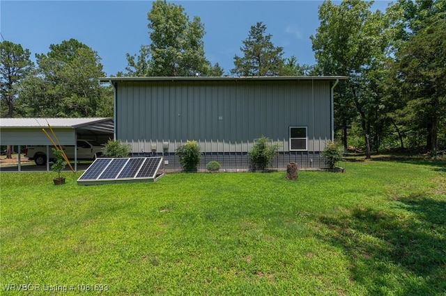 11667 Falling Rock Rd, Havana, AR 72842 - view of outbuilding featuring solar panels and a carport