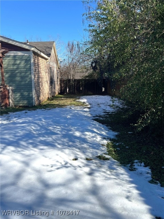 view of snowy yard