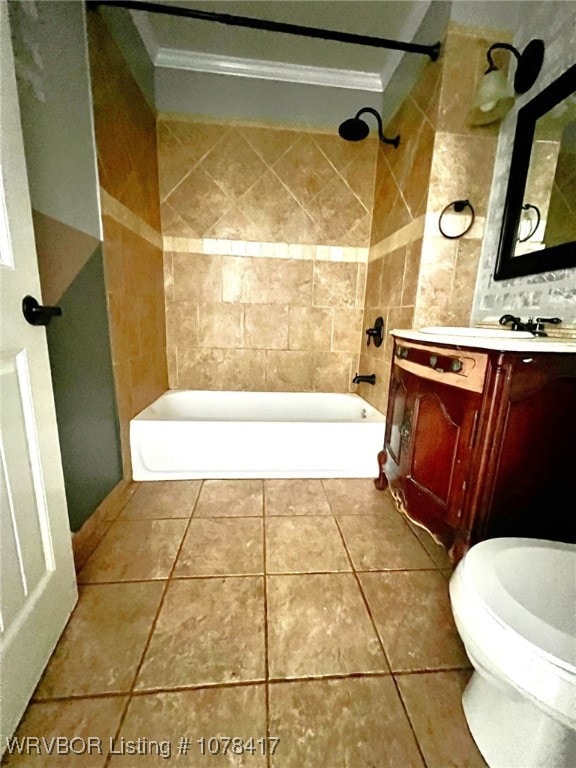 bathroom with vanity, tile patterned flooring, and tiled shower / bath combo