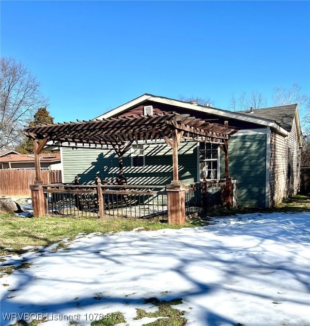 exterior space with a pergola