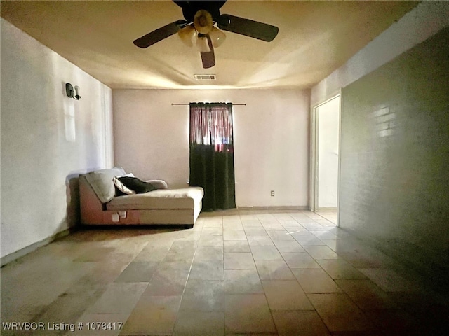 unfurnished room featuring ceiling fan