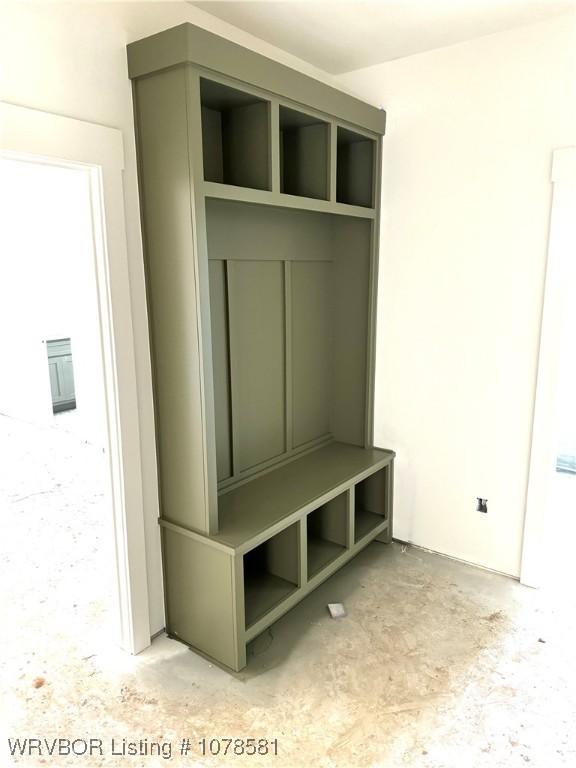 mudroom featuring unfinished concrete floors