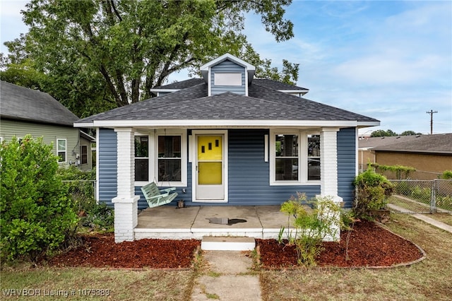 bungalow-style house featuring covered porch