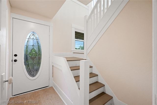 entryway featuring light hardwood / wood-style flooring and a healthy amount of sunlight