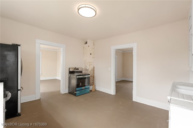 kitchen featuring concrete flooring and appliances with stainless steel finishes