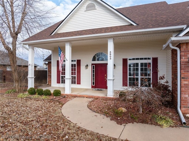 entrance to property with covered porch