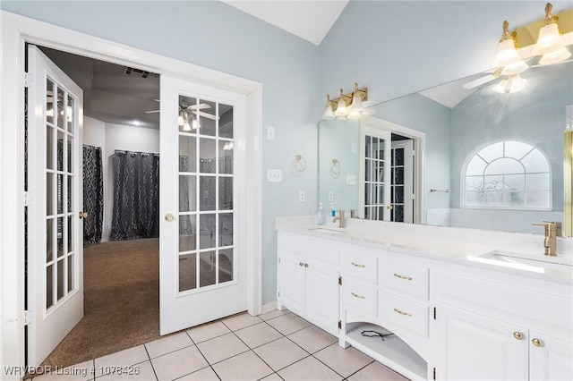 bathroom featuring ceiling fan, tile patterned flooring, french doors, and vanity