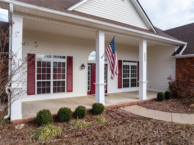 entrance to property with covered porch