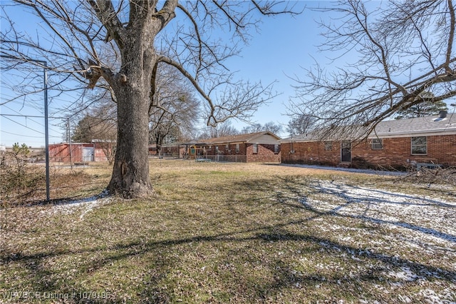 view of yard with fence