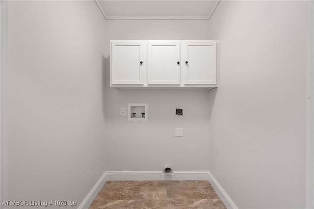 clothes washing area with cabinet space, hookup for a washing machine, baseboards, and hookup for an electric dryer