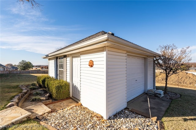 view of outbuilding featuring a garage