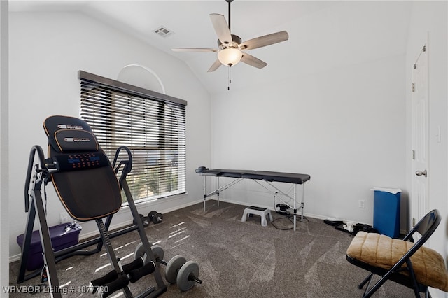 workout area with ceiling fan, carpet floors, and vaulted ceiling