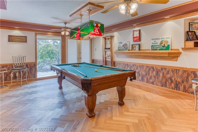 playroom featuring ceiling fan, french doors, billiards, light parquet floors, and ornamental molding