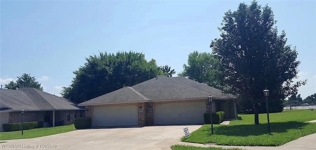 1803 Wilder Ln Unit A, B & A, B, Alma, AR 72921 - view of side of home with an attached garage, a lawn, and driveway