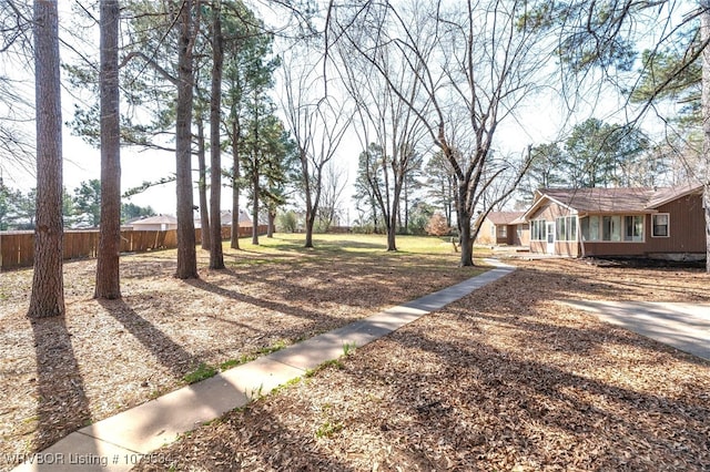 view of yard with fence