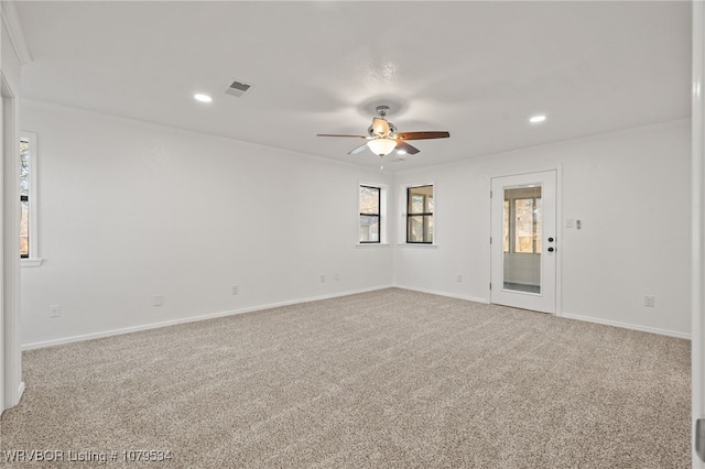 empty room featuring recessed lighting, visible vents, light colored carpet, and ceiling fan