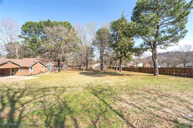 view of yard with fence