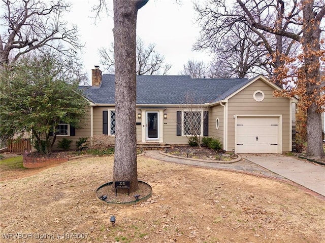 ranch-style house featuring a garage