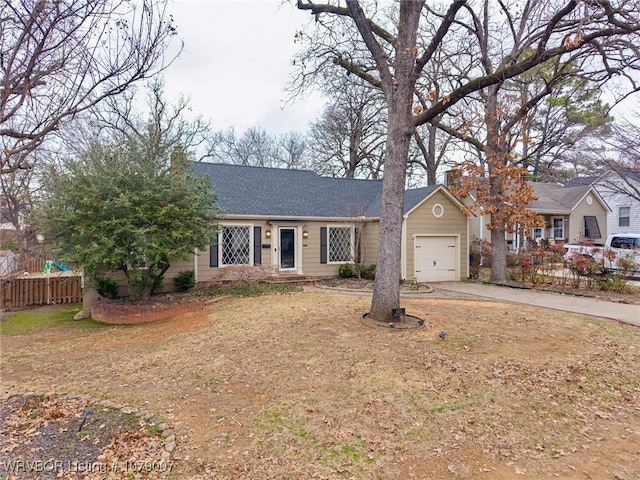 ranch-style home with a garage