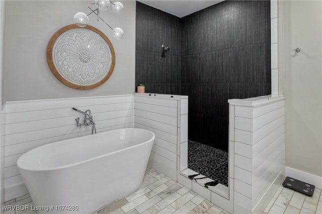 bathroom featuring tile patterned flooring and independent shower and bath