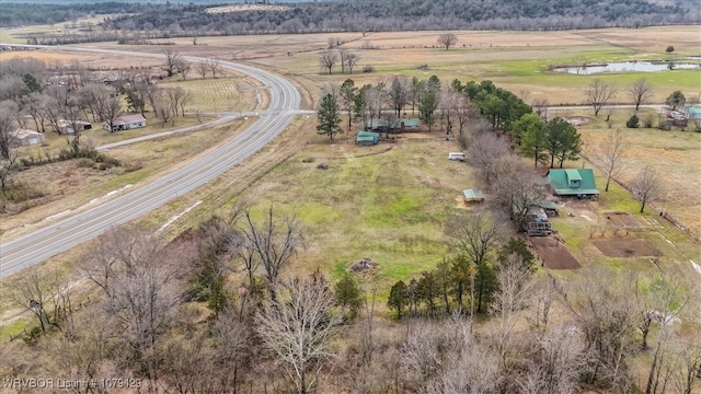 bird's eye view with a water view and a rural view