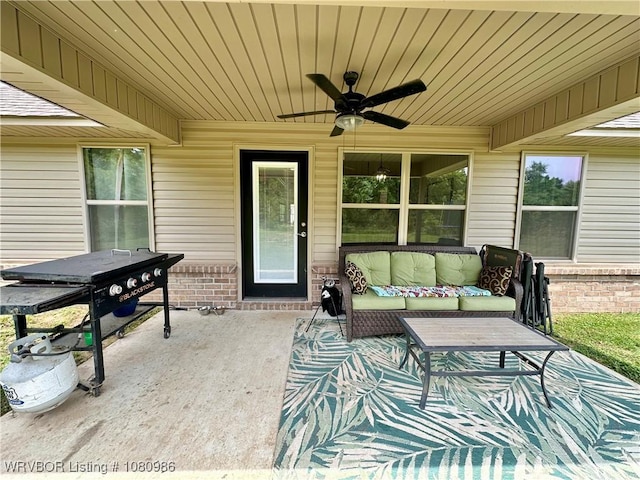 309 Arcadia Dr, Poteau, OK 74953 - view of patio / terrace featuring a ceiling fan and outdoor lounge area