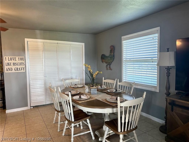 7434 N 217th Hwy, Charleston, AR 72933 - dining space with tile patterned floors and baseboards