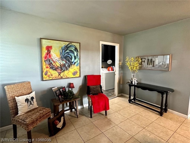 7434 N 217th Hwy, Charleston, AR 72933 - sitting room with washer / clothes dryer and light tile patterned flooring