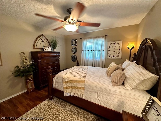 7434 N 217th Hwy, Charleston, AR 72933 - bedroom with a textured ceiling, wood finished floors, and a ceiling fan