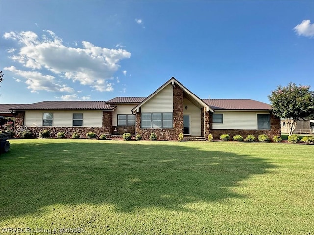 7434 N 217th Hwy, Charleston, AR 72933 - ranch-style house featuring a metal roof, a front lawn, and stone siding
