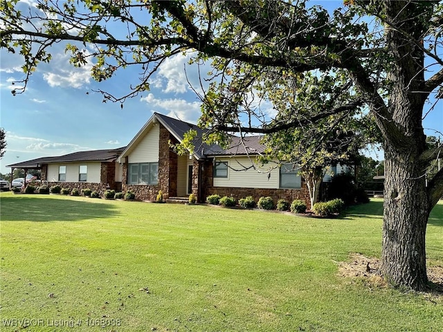 7434 N 217th Hwy, Charleston, AR 72933 - single story home featuring a front yard and stone siding