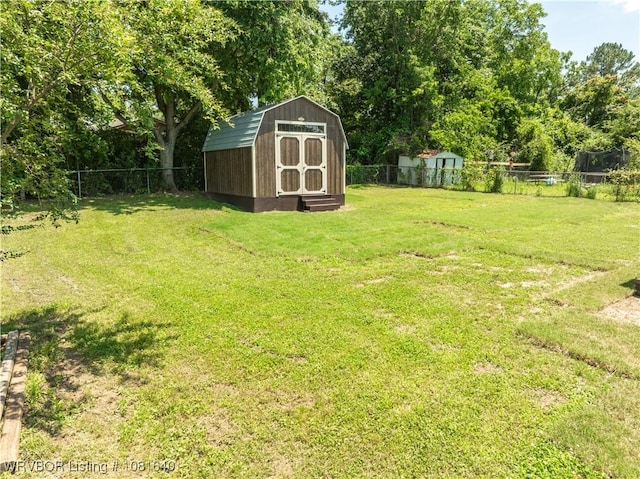101 S 42nd St, Van Buren, AR 72956 - fenced backyard with a storage shed and view of scattered trees
