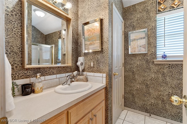 6501 Galven Way, Fort Smith, AR 72916 - full bath featuring vanity, tile patterned flooring, a shower stall, and vaulted ceiling