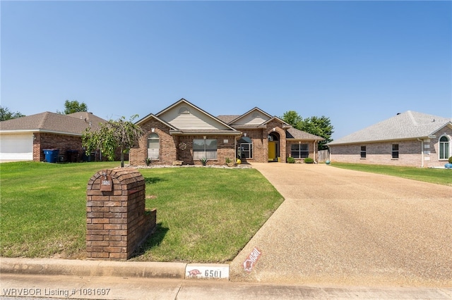6501 Galven Way, Fort Smith, AR 72916 - view of front of home with driveway, a front yard, and brick siding