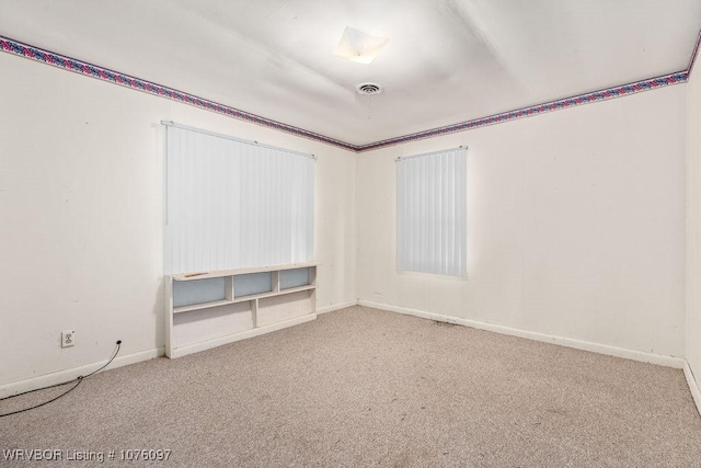 view of carpeted spare room