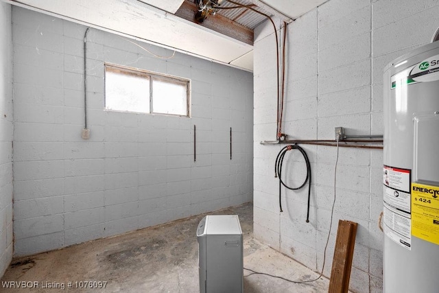 basement featuring electric water heater