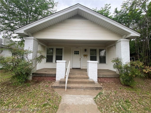 bungalow-style house featuring covered porch