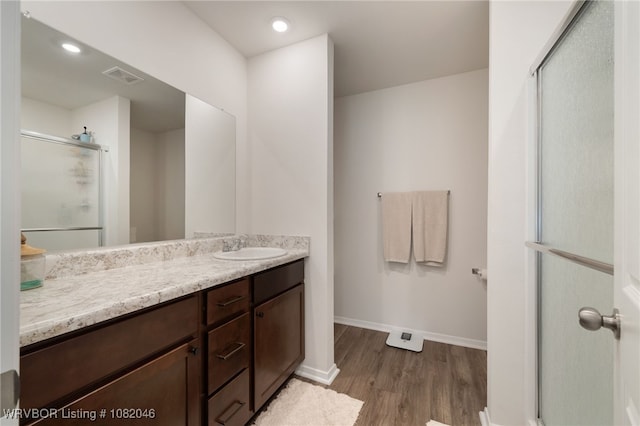 10618 Cedar Way, Fort Smith, AR 72916 - bathroom with vanity, a shower stall, and wood finished floors