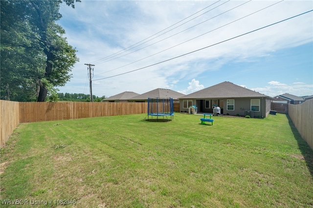 10618 Cedar Way, Fort Smith, AR 72916 - fenced backyard featuring a trampoline