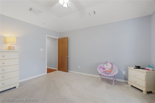 unfurnished bedroom with baseboards, visible vents, and light carpet