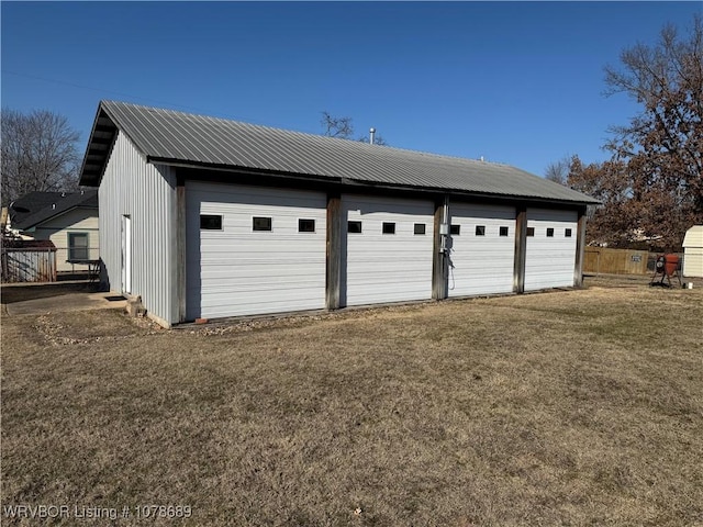 garage with a lawn