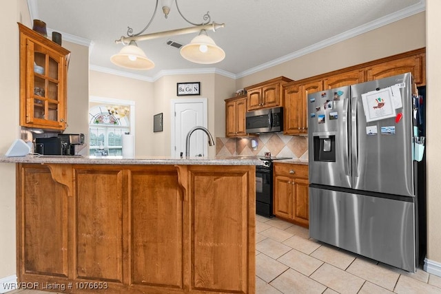 kitchen featuring decorative backsplash, appliances with stainless steel finishes, crown molding, sink, and light tile patterned floors