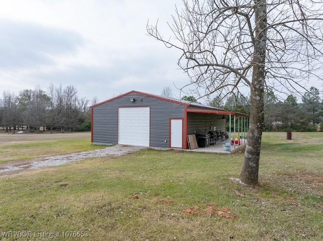 garage featuring a yard