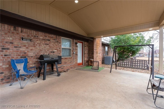 view of patio featuring a grill and central AC unit