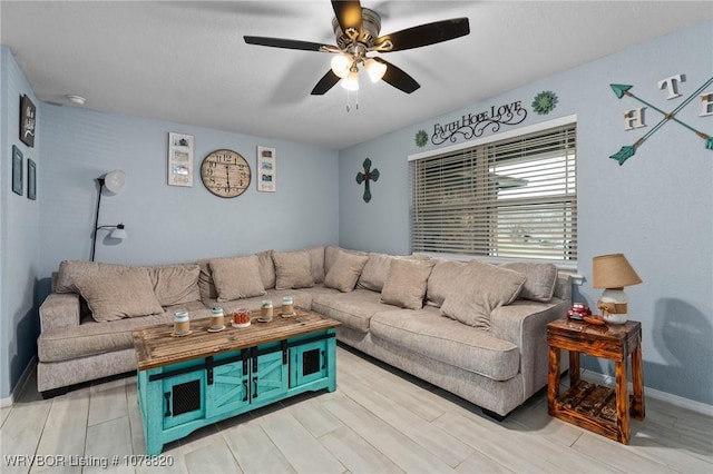 living room with ceiling fan