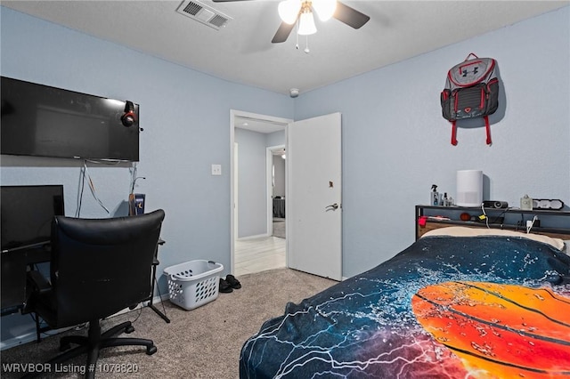 bedroom featuring ceiling fan and carpet flooring