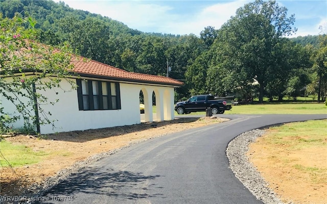 view of side of property featuring a mountain view